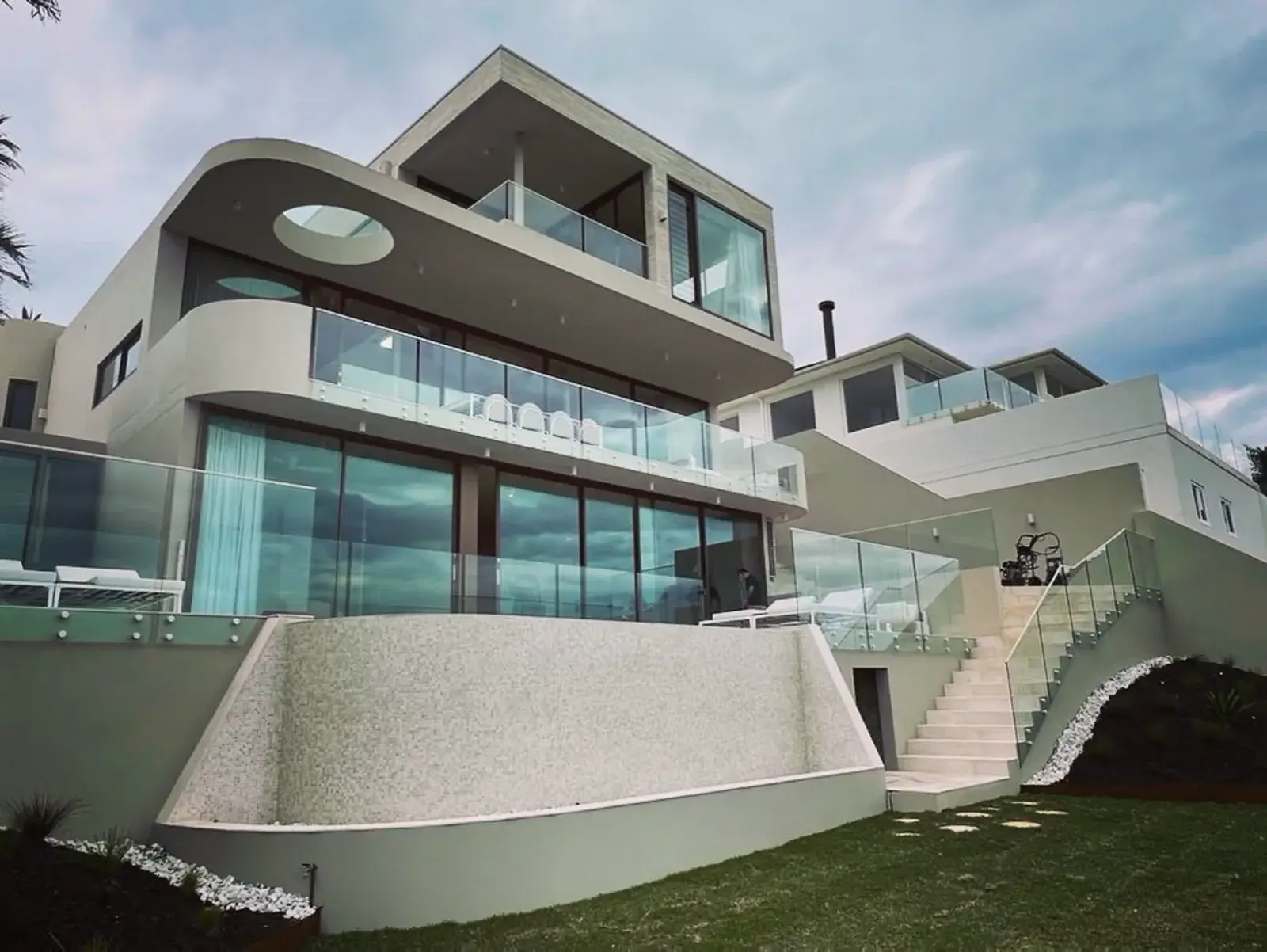 Glass Armour nano coating applied to the windows and glass fencing of a luxury coastal home