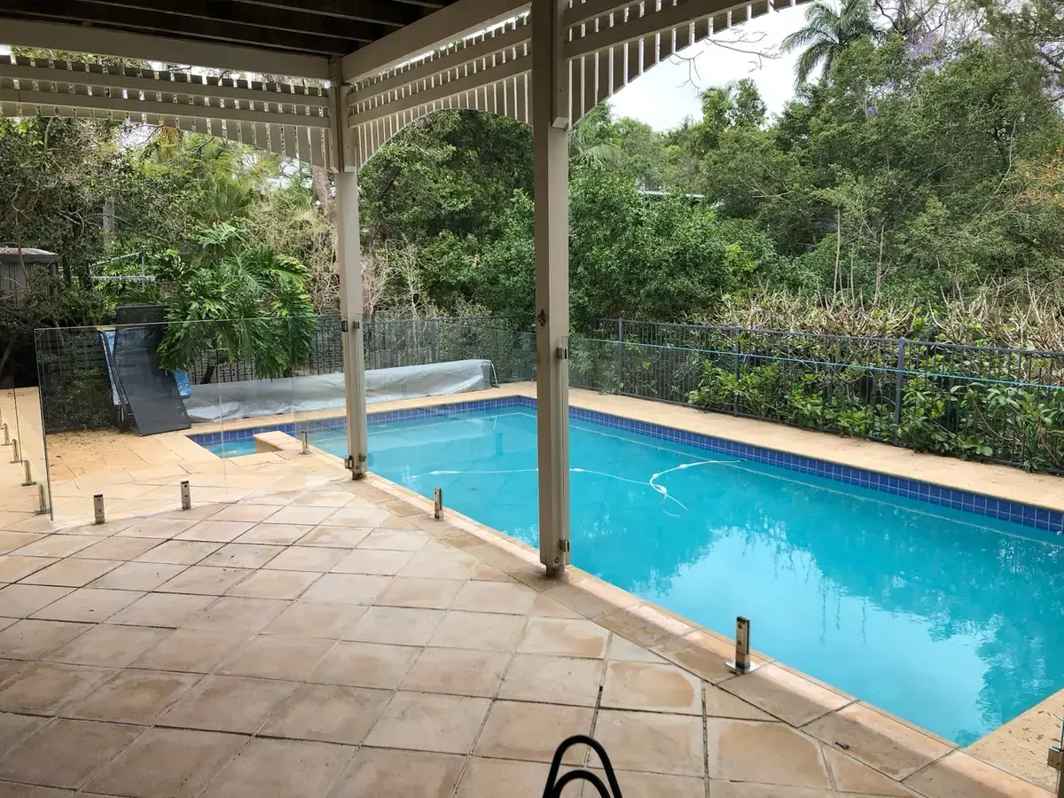 Clear pool fence glass after professional restoration